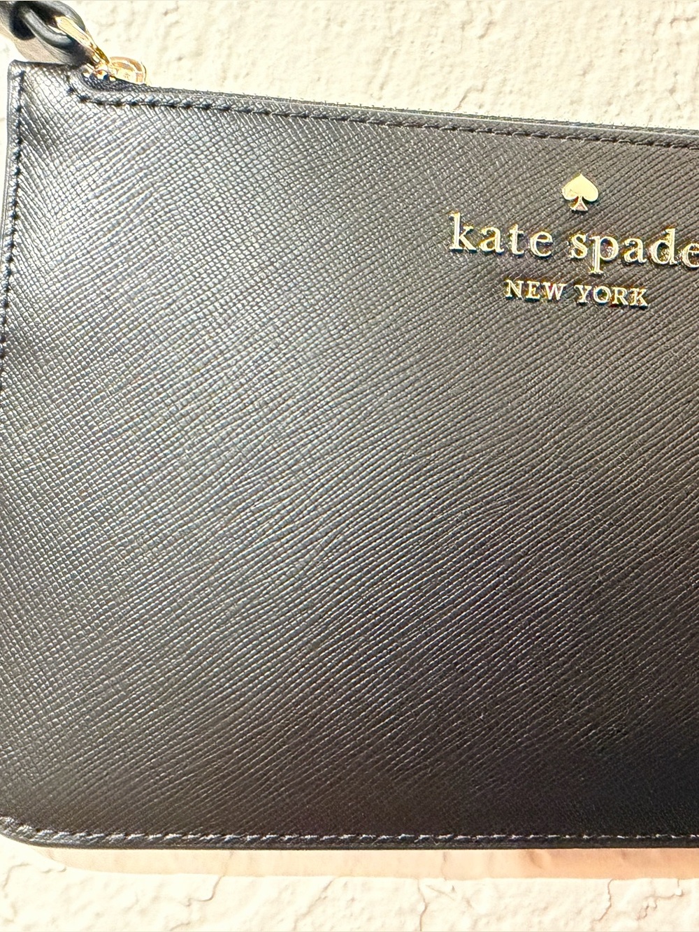 kate spade black wristlet with gold hardware